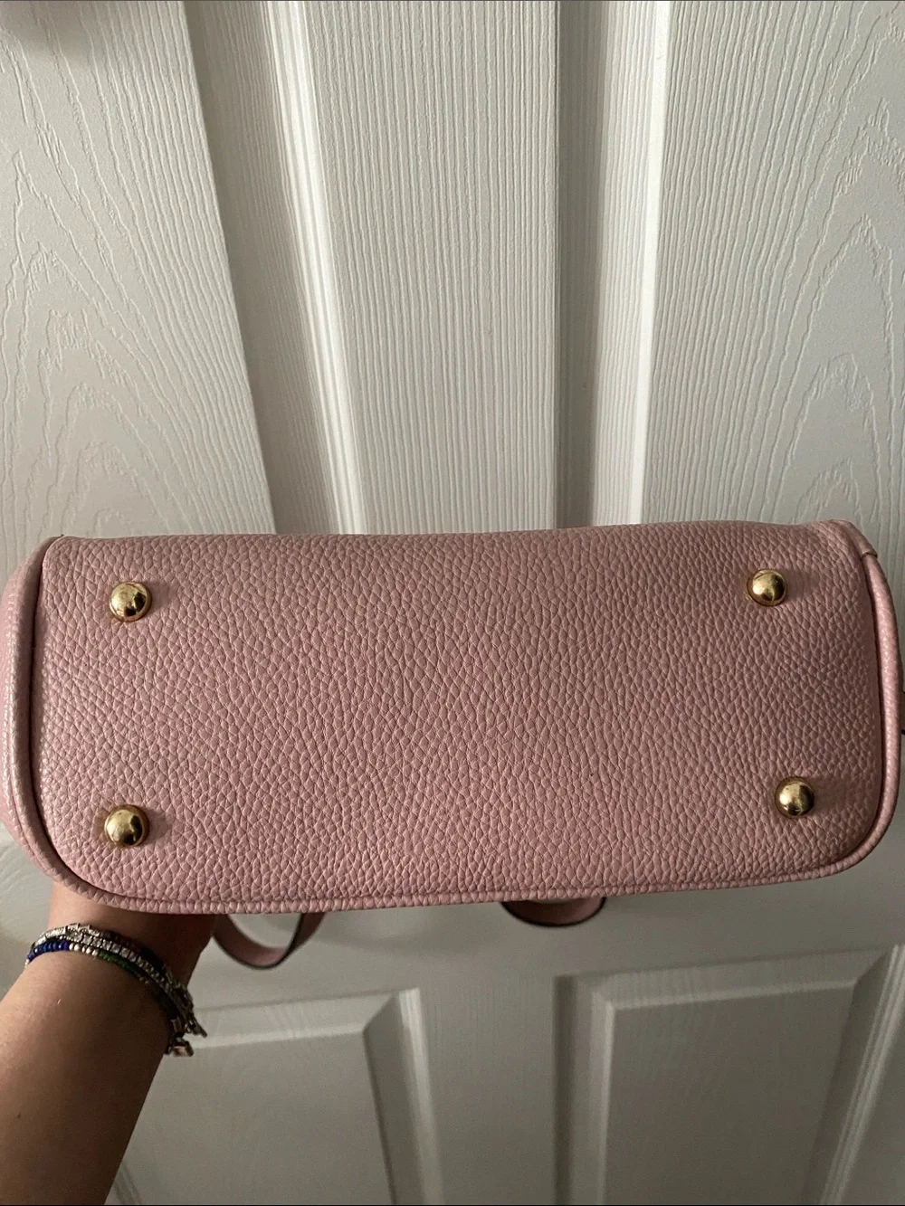 Blush Pink Mini Backpack with Gold Hardware and Striped Lining.